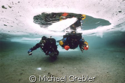 Using cave techniques, divers at the start of their dive ... by Michael Grebler 